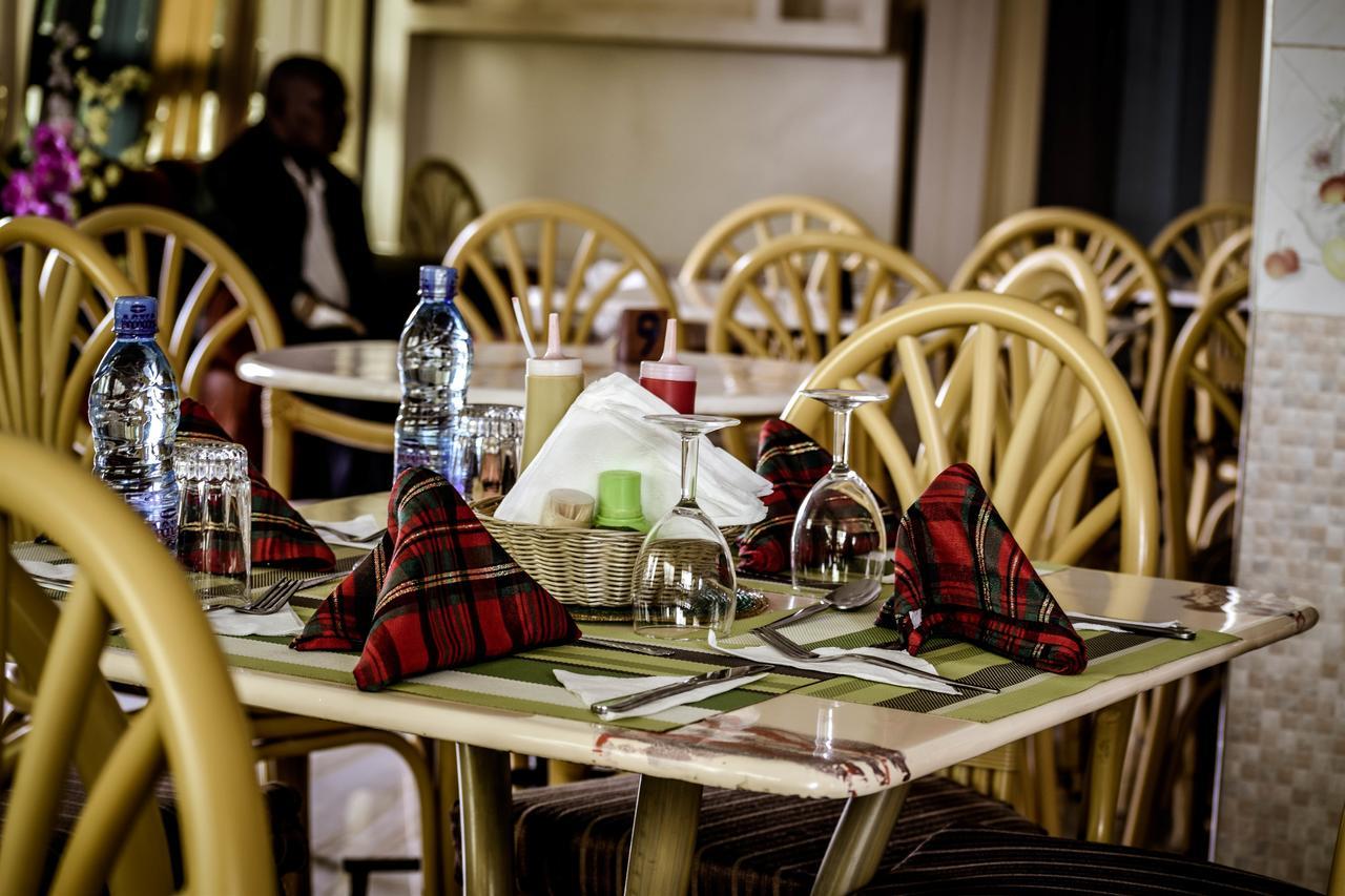 The Joy Hotel Voi Exterior photo
